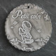 faïence ronde "Petit coin" (petite fille sur son pot)